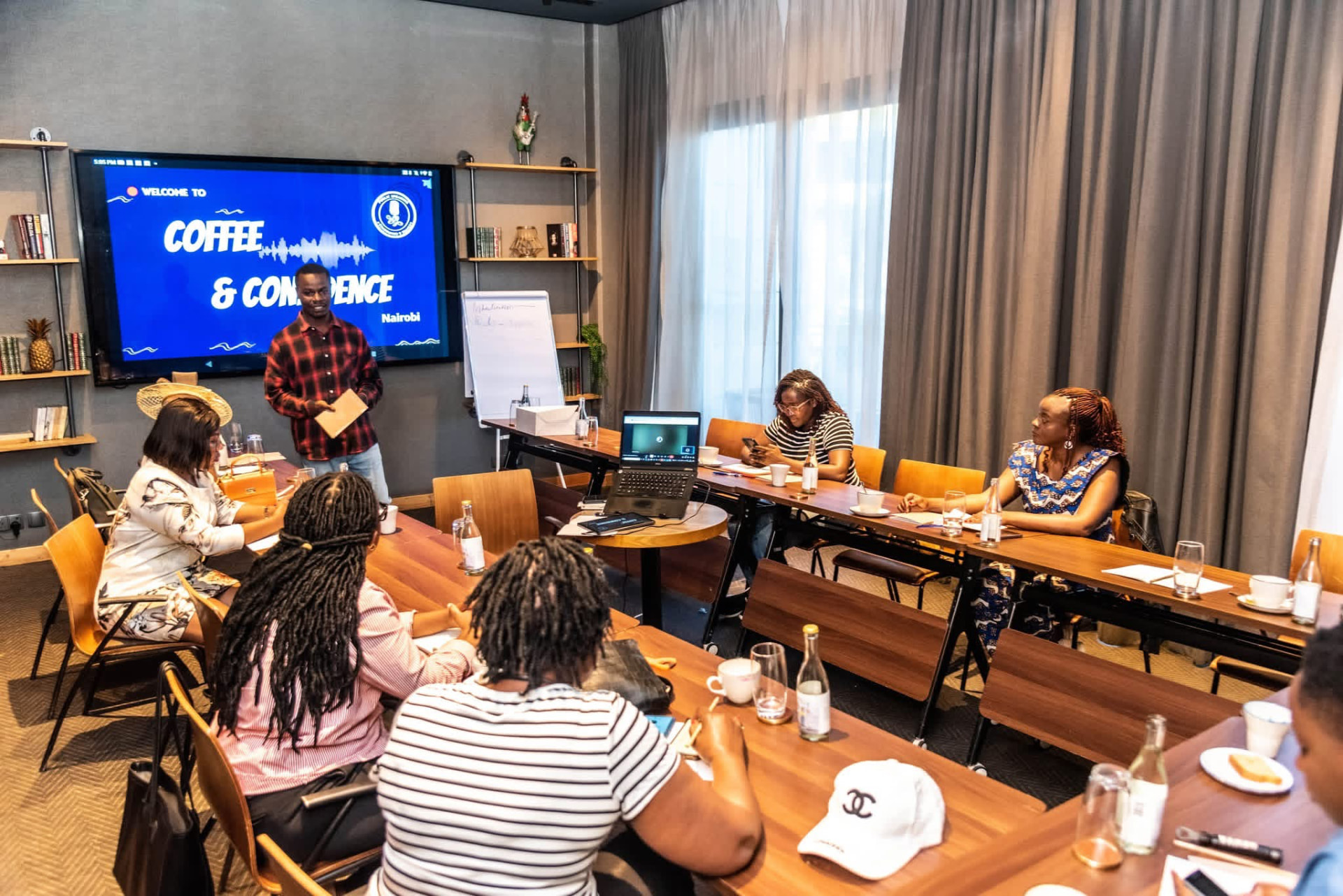 A Coffee & Confidence public speaking session in progress